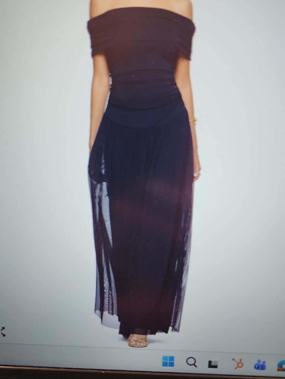 Elegant Flow, A Sleek, Off-the-shoulder Sheath With An Overlay At The Skirt.
